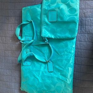 Bright blue Coach Weekender Bag